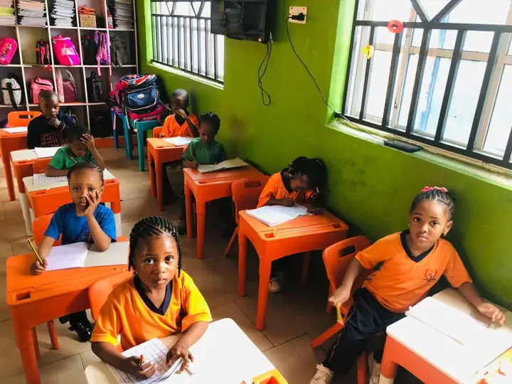 Nursery pupils learning in class
